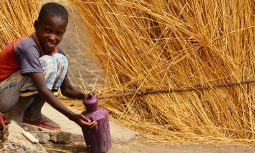 In Blue Nile State in Sudan a boy washes his hands in a village where UNICEF has been promoting good hygiene practices.